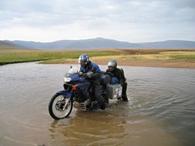 Crossing rivers in Mongolia.