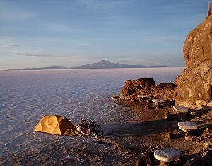 July: by Rupert Wilson-Young, UK; Evening light over our Salar de Uyuni camp, Bolivia. Alaska to Tierra del Fuego on a Yamaha Vino 49cc scooter, with my girlfriend doing the same trip, but by bicycle.