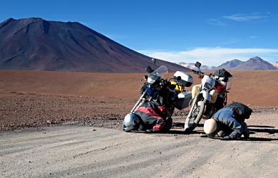 Kissing the pavement after murderous miles of deep sand and gravel, strong winds and cold temperatures.