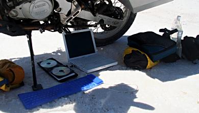 My outdoor office at which I pen these posts, complete with external keyboard (in blue).