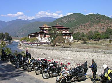 Photo line up of the motorcycles outside Punakha Dzong, Bhutan.