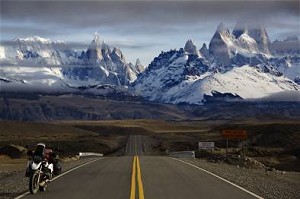 by Marc Gibaud, France, www.transam.fr; Wild Patagonia in the late autumn - clouds between the road and the top of the peaks of 'Tres Cerros' and 'Mount Fitzroy', BMW R1100GS.