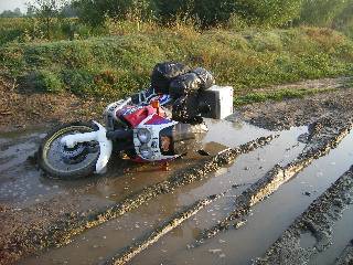 Bike drop number 18 happened at 7am on the way to a boat trip on the Danube Delta (birding fun for JB), BIG muddy puddle.