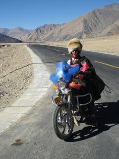 Tibetan motorcyclist.