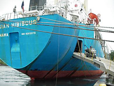 Uncrating on the vessel and riding ashore, Palau.