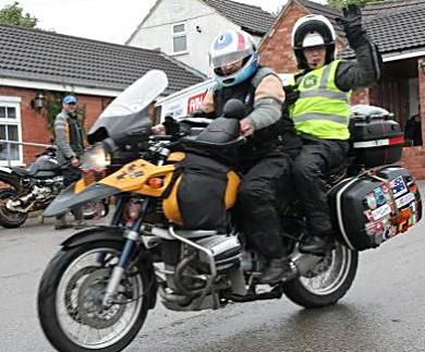 Colin and Dee Masters leaving Ripley bound for Russia.