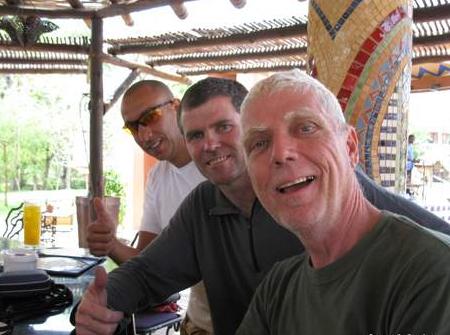 Miles and David together with Martin a travelling Priest at the Zambezi Sun Bar.