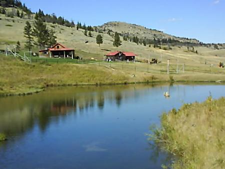 Montana pond and cabins.