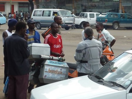 Negotiating currency exchange in Zimbabwe.