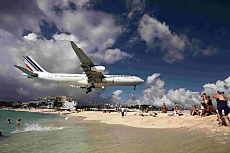 Airplane landing on the beach, Brazil.