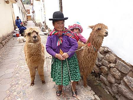 Lady with llamas, Cusco, Peru.