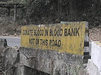 Donate blood road sign.