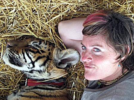 Cuddling tigers in Lujan.