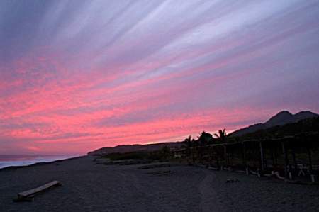 Sunset at the small surfing town of Barra de Nexpa, north of Acapulco, Mexico.