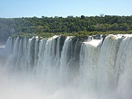 The breathtaking 'Devil's Throat' falls, with the Brazilian Tower in the distance.