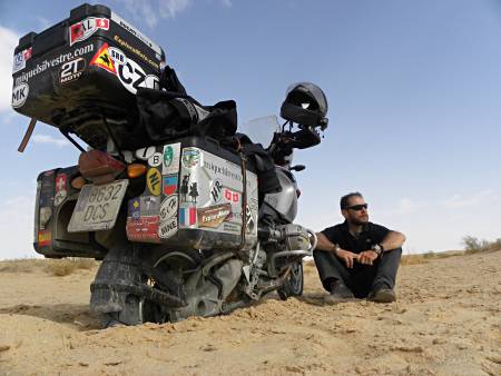 Bike sunk in the sand of the Sahara.