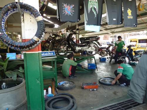 Motorcycle repair shop in Thailand.