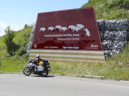 Head-Smashed-In-Buffalo-Jump sign with bike.
