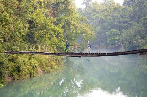 Heike on bridge, Nepal.