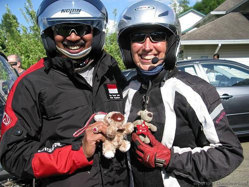 Karen Browne and Jeffrey Polnaja with mascots.