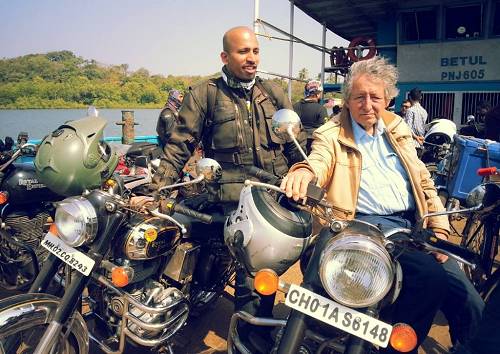 Ted Simon on ferry in India with Jay Kanniayan.