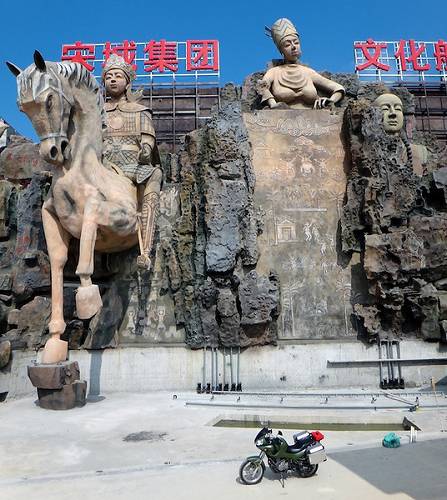 Romance park statue and bike in China.