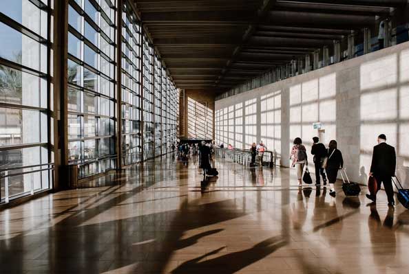 People at an airport for a trip