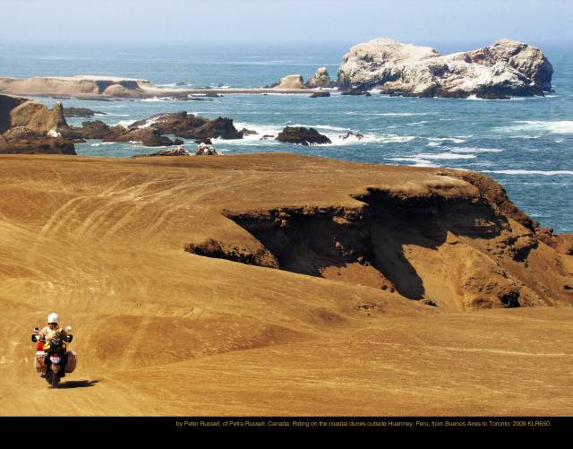 by Peter Russell, of Petra Russell, Canada; Riding on the coastal dunes outside Huarmey, Peru, from Buenos Aires to Toronto; 2009 KLR650.