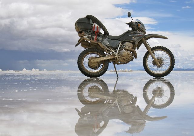 February: by Jacek Dubiel, Poland/Canada. Salar de Uyuni, Bolivia, during the rainy season on our Peru/Bolivia Tour; Honda Tornado XR250. 