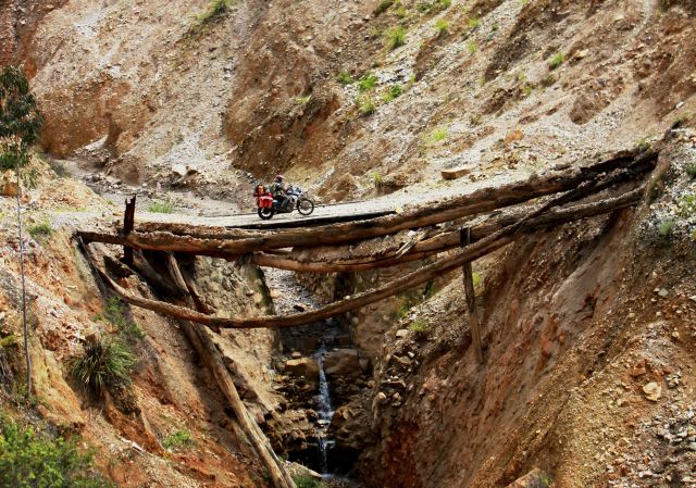 November: by Naomi Tweddle, of Alberto Lara, Canada. 'I sure hope this bridge holds!' Near Angasmarca, Peru , on our Americas tour; F800GS.