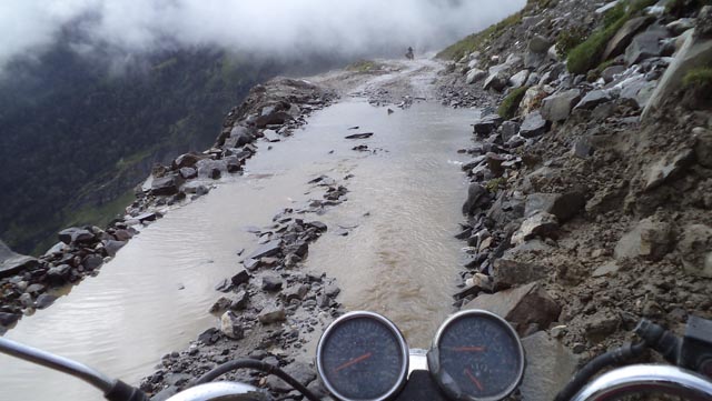 Photo by Gregor Zajac, Poland; Crossing Rothang Pass; India 2011 tour, Royal Enfield 350ccm