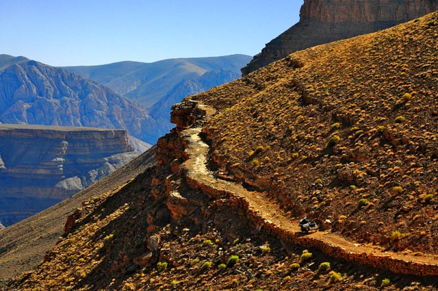 Photo by Hubert Kriegel, of Jean-Louis Grauby, Dades Gorge, Morocco, during the 8th year of 'thetimelessride'. Ten years on the road on his 2008 Ural Sportsman