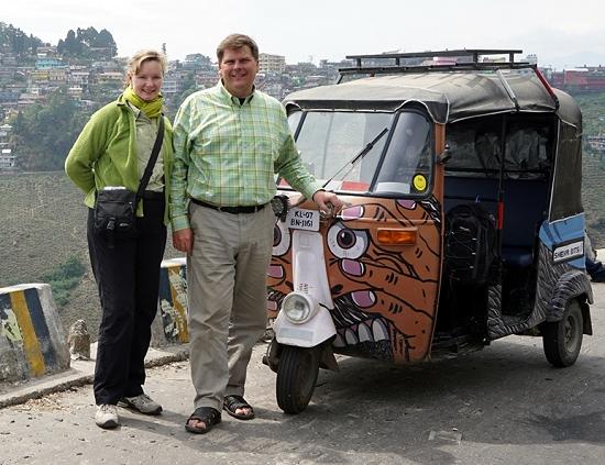 Tracey Martin and Miles McEwing with tuk-tuk.