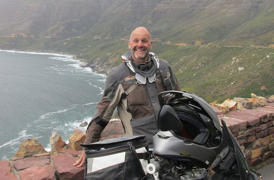 Rene smiling with his bike