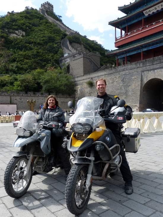 Ekke and Audrey Kok, astride their motorcycles.