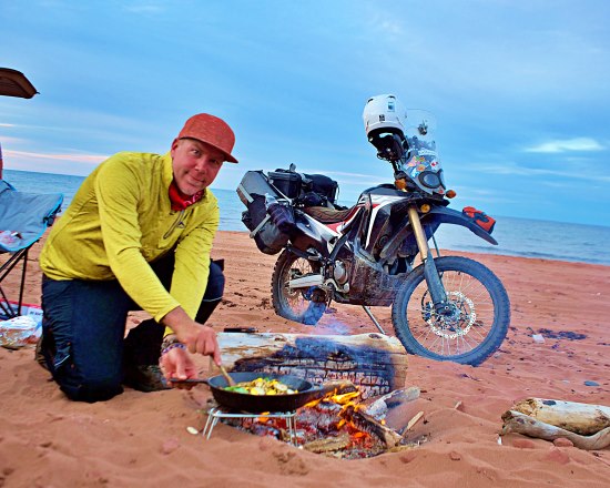 Kix Marshall, beach cooking.