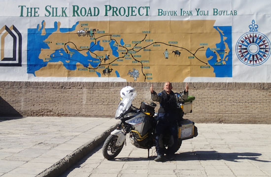 Jean-Michel in front of Silk Road banner.