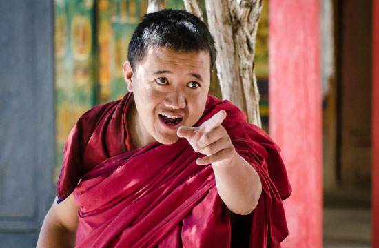 A monk speaking dynamically