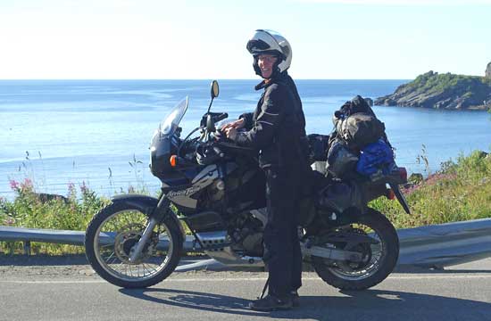 Doro on her bike by the water.