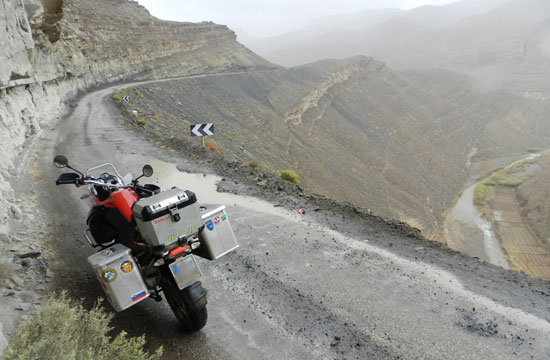 A rest stop overlooking hilly roads.