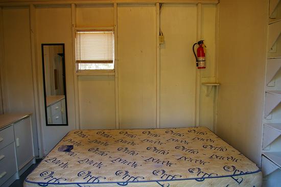 Camp Tamarack - double bed in cabin.