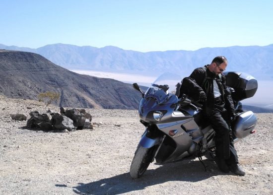 Gabriel Charest with motorcycle.