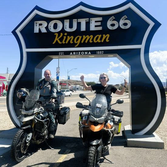 Cindy and Duncan Bennett, Route 66 sign.