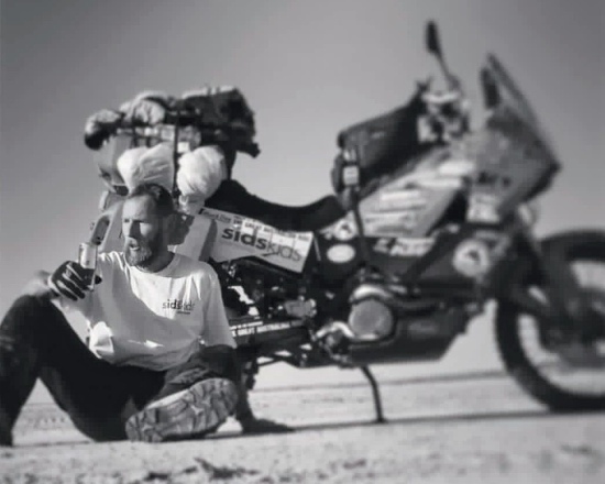 Stuart Ball with motorcycle.