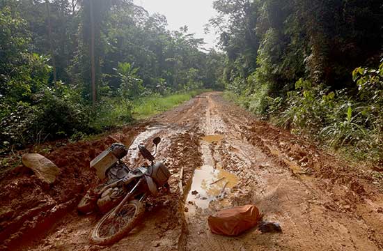 Bike down on a very muddy road