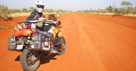 Rider on a dusty trail.