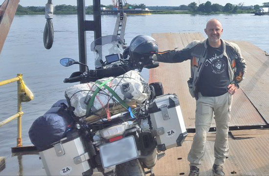 Charles with bike on a dock