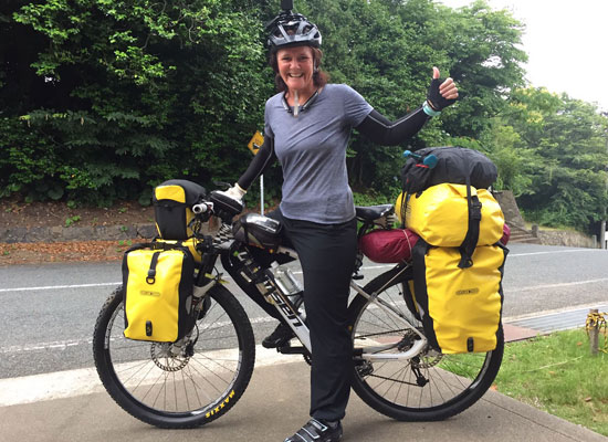 Christina and her loaded bike.