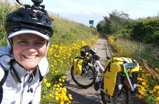 Riding a flowery path.