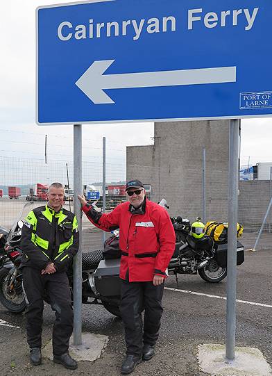 Roger Sinclair (left) waiting for a ferry in Ireland with RTW colleague Sean Gallagher.